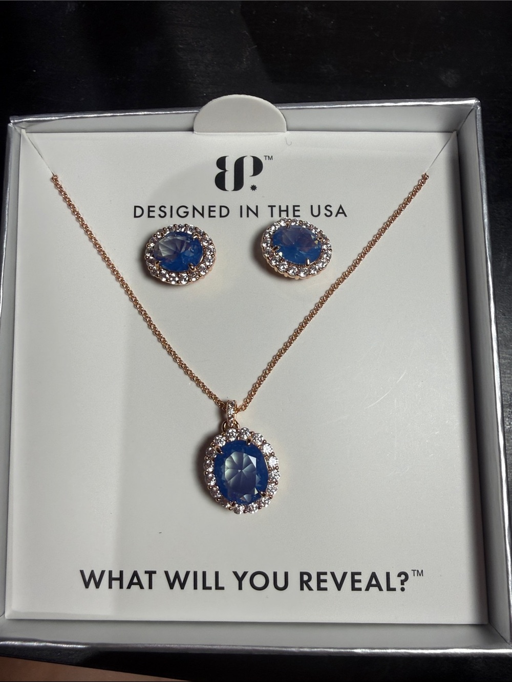 bp Rose Gold Necklace with Deep Blue Crystal Pendant and Matching Earrings